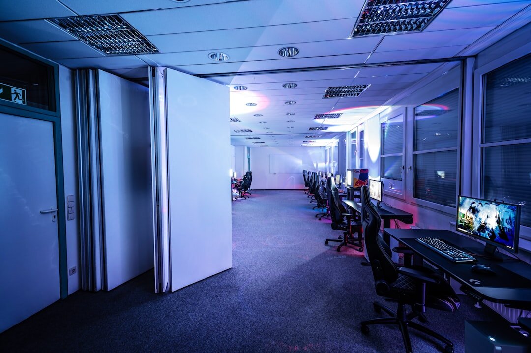 Modern broadcast facility interior with technical equipment racks
