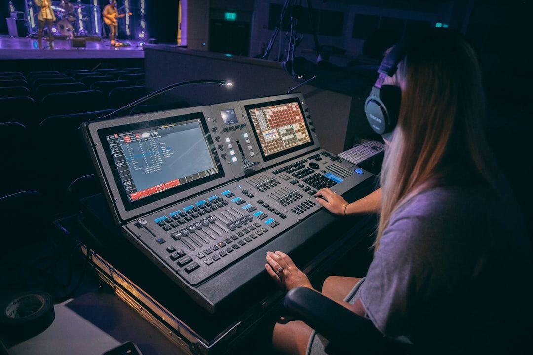 Engineer working inside a remote broadcast production truck
