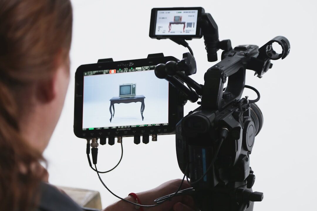 Finnish male camera operator filming in a TV studio